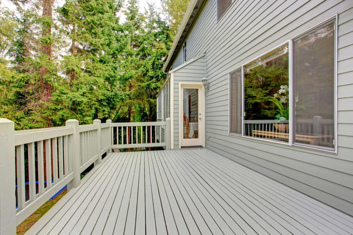 Wooden walkout deck with railings